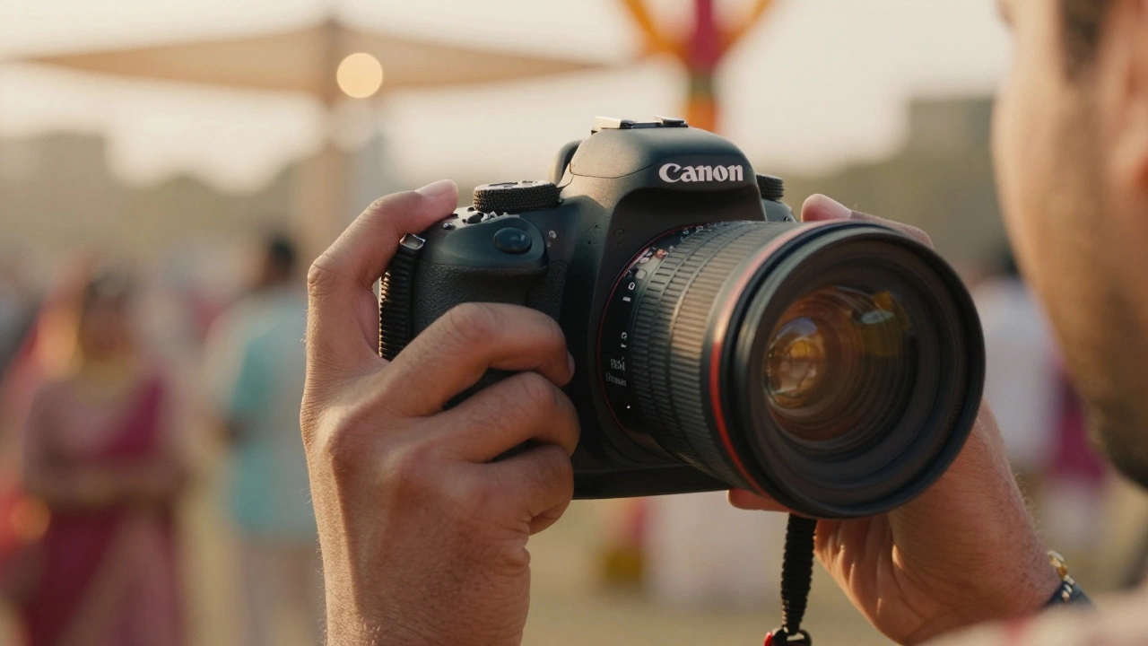 Close-up of a Canon DSLR camera held by a photographer at an Indian wedding venue.
